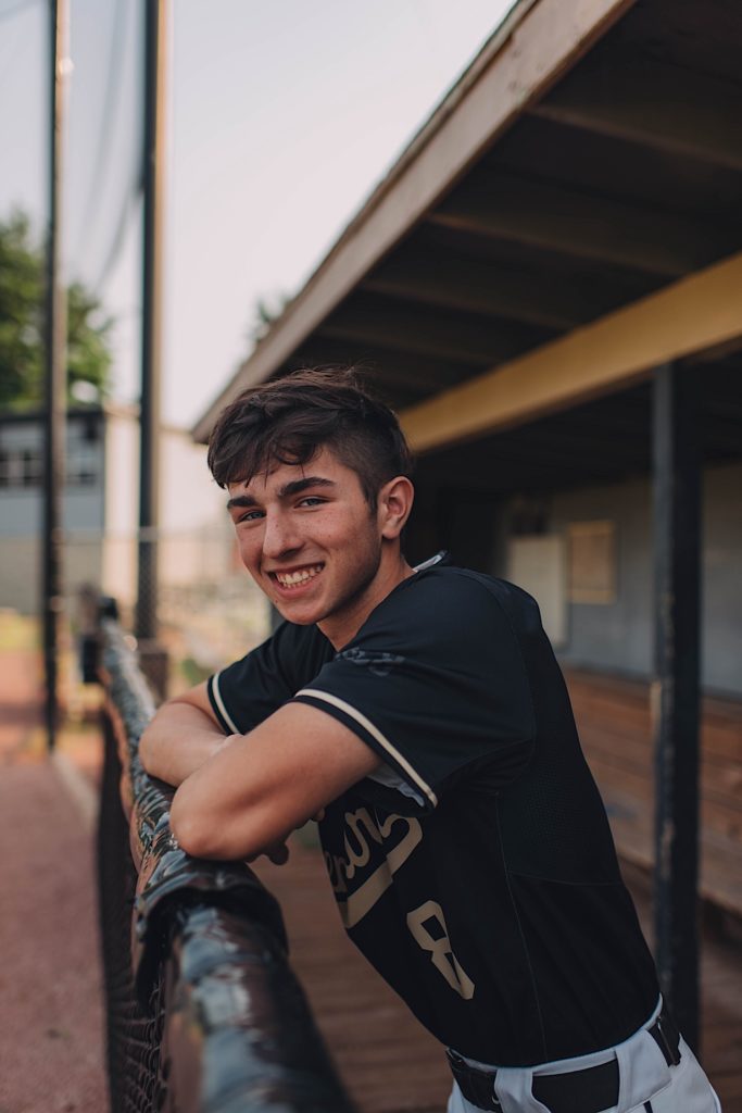 Senior portrait at baseball field